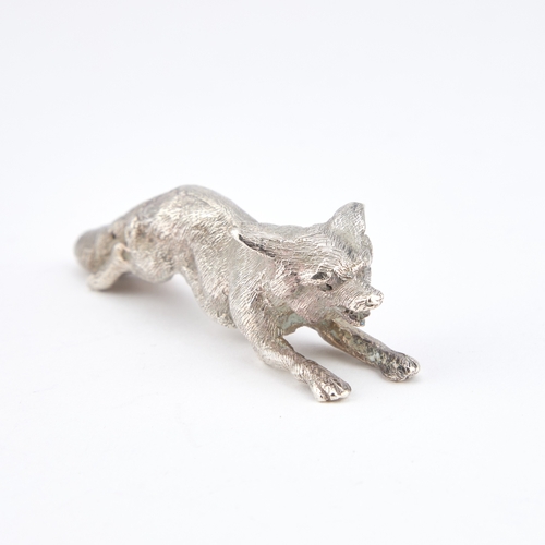 345 - AN ELIZABETH II CAST SILVER MODEL OF A FOX by S M D, London 1968, modelled running. 9cm long, 3.3 tr... 