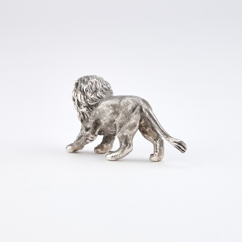 349 - AN ELIZABETH II CAST SILVER MODEL OF A LION by Mappin & Webb Ltd, London 1987, modelled standing... 