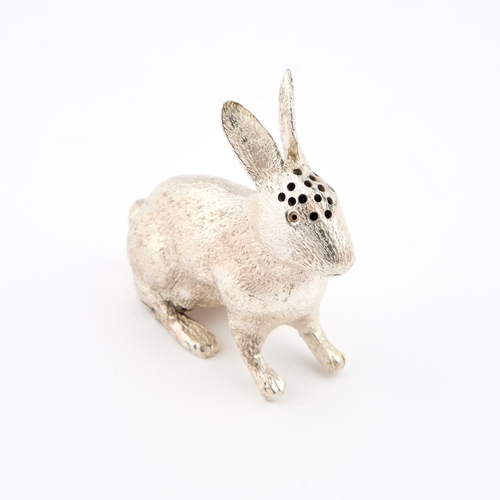 382 - A GEORGE V SILVER NOVELTY PEPPER POT by Singleton, Benda & Co Ltd, London 1912, cast as a rabbit... 