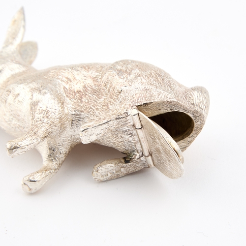 382 - A GEORGE V SILVER NOVELTY PEPPER POT by Singleton, Benda & Co Ltd, London 1912, cast as a rabbit... 