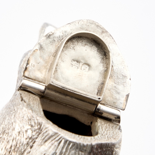 382 - A GEORGE V SILVER NOVELTY PEPPER POT by Singleton, Benda & Co Ltd, London 1912, cast as a rabbit... 