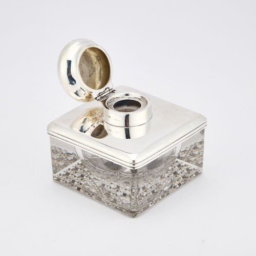 397 - AN EDWARDIAN SILVER-MOUNTED INKWELL by William Harrison Walter, Birmingham 1906, square, the glass b... 