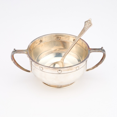 409 - A GEORGE V SILVER PORRINGER by Barker Brothers Silver Ltd, Birmingham 1927, circular with rounded si... 