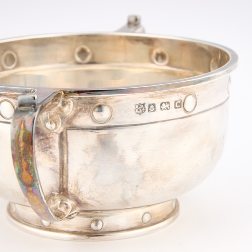 409 - A GEORGE V SILVER PORRINGER by Barker Brothers Silver Ltd, Birmingham 1927, circular with rounded si... 