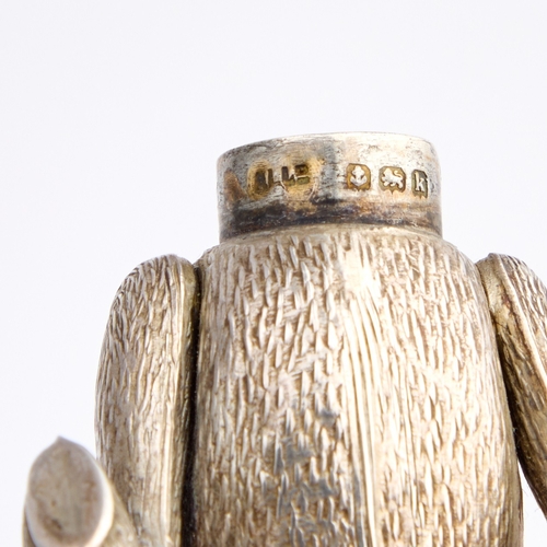 410 - AN EDWARDIAN SILVER NOVELTY PEPPER POT by Adie & Lovekin Ltd, Birmingham 1909, modelled as a ted... 