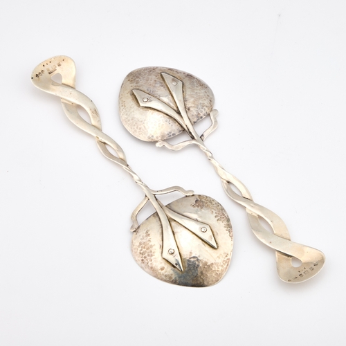 413 - OLIVER BAKER FOR LIBERTY & CO, A PAIR OF CYMRIC SILVER SPOONS by Liberty & Co Ltd, Birmingham 19... 