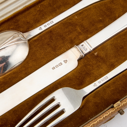 417 - A GEORGE V SILVER THREE-PIECE CHRISTENING SET by Harrods Ltd, London 1924, comprising a knife, fork ... 