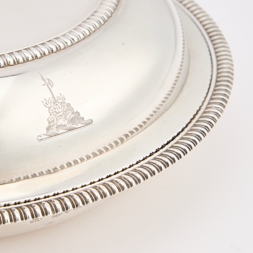 451 - A GEORGE IV SILVER ENTRÉE DISH AND COVER by Paul Storr, London 1825, circular, with reel moulded bor... 