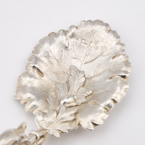 468 - A VICTORIAN NATURALISTIC SILVER CADDY SPOON by George Unite, Birmingham 1850, the leaf-form bowl wit... 