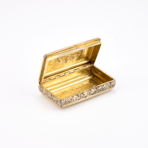 475 - A GEORGE III SILVER AND PARCEL-GILT SNUFF BOX maker J F, London 1819, rectangular, the hinged cover ... 