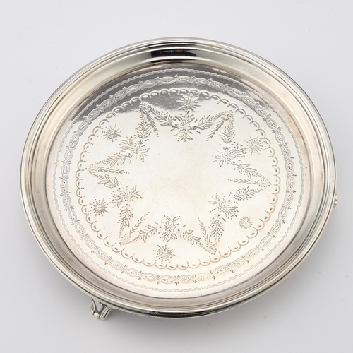 479 - A GEORGE III SILVER WAITER by Thomas Hayter, London 1807, circular, with a reeded edge and three tap... 