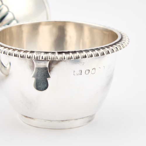 494 - A GEORGE III SILVER WINE FUNNEL by William Burwash, London 1818, with a bead and reel border, the bo... 