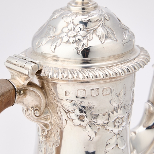 502 - A GEORGE III SILVER COFFEE POT by Benjamin Bickerton, date letter indistinct, of baluster form, now ... 