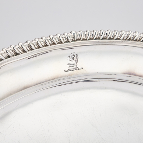 511 - A GEORGE III SILVER MEAT DISH by Paul Storr, London 1794, of cusped oval form with a gadrooned edge,... 