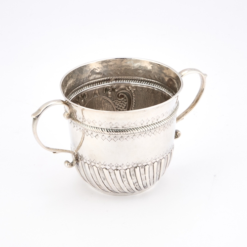 526 - A QUEEN ANNE BRITANNIA STANDARD SILVER PORRINGER by William Charnelhouse, London 1705, of circular, ... 