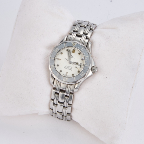 568 - A LADY'S STEEL OMEGA SEAMASTER BRACELET WATCH the circular white dial with baton/ dot indices signed... 