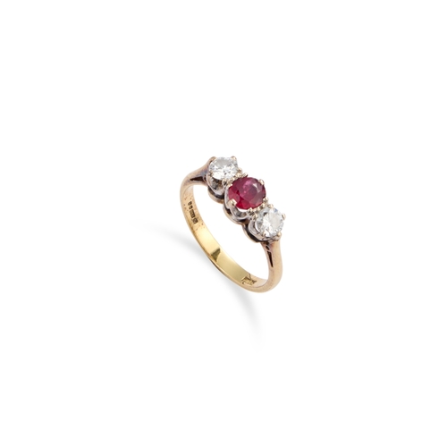 622 - AN 18 CARAT GOLD RUBY AND DIAMOND THREE STONE RING an oval-cut ruby spaced by round brilliant-cut di... 