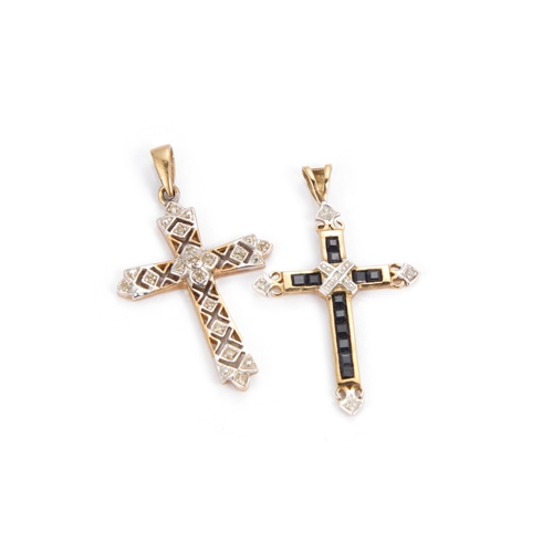 628 - TWO 9 CARAT GOLD CROSS PENDANTS comprising the first a fancy pierced diamond-set example and the sec... 