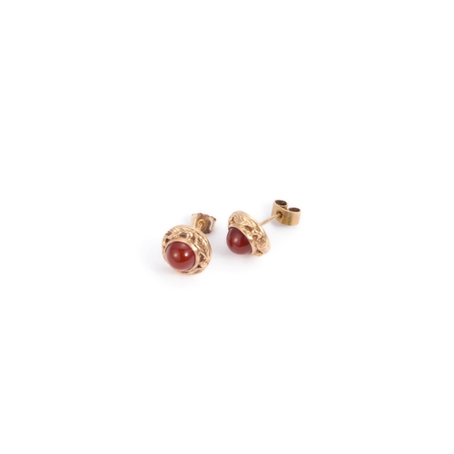 640 - A PAIR OF 9 CARAT GOLD CARNELIAN STUD EARRINGS round cabochon carnelian within fancy leaf and berry ... 