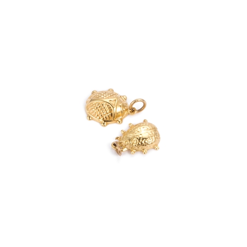 656 - TWO LADYBIRD CHARMS unmarked. (2) 2cm by 1cm and smaller, 1.6 grams grossXRF test as 9 carat gold. G... 