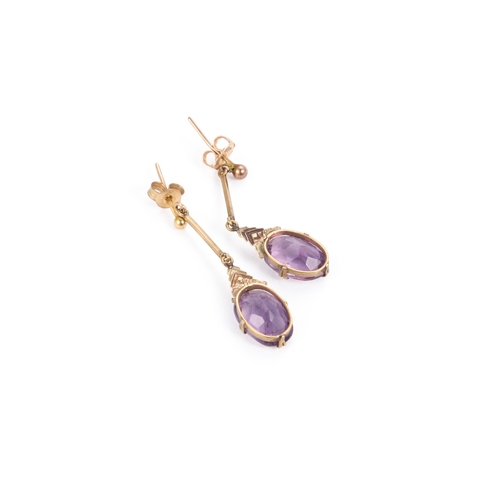 661 - A PAIR OF 9 CARAT GOLD AMETHYST PENDANT EARRINGS oval-cut amethysts suspended from bar surmounts, wi... 