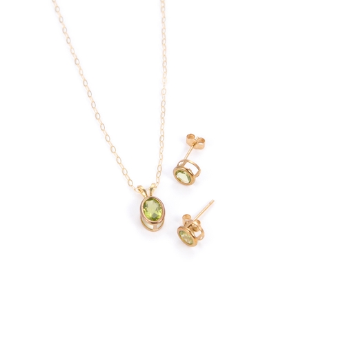 664 - A PERIDOT PENDANT NECKLACE AND EARRING SET the pendant with an oval-cut peridot to a fine chain, the... 