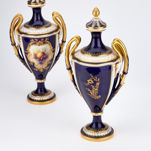 75 - A PAIR OF ROYAL WORCESTER FRUIT-PAINTED TWO-HANDLED VASES AND COVERS BY RICHARD SEBRIGHT the taperin... 