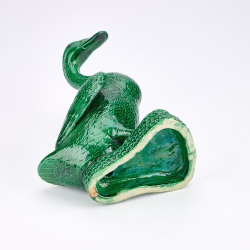 84 - A CHINESE GREEN-GLAZED MODEL OF A DUCK 24cm high