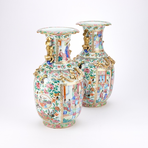 91 - A PAIR OF CHINESE FAMILLE ROSE VASES CANTON, MID-19TH CENTURY each of baluster form, the waisted nec... 