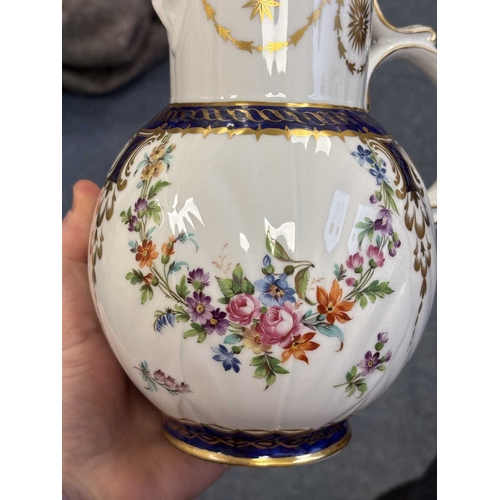 100 - TWO 18TH CENTURY GERMAN PORCELAIN CUPS AND SAUCERS painted with flowers; together with a French porc... 