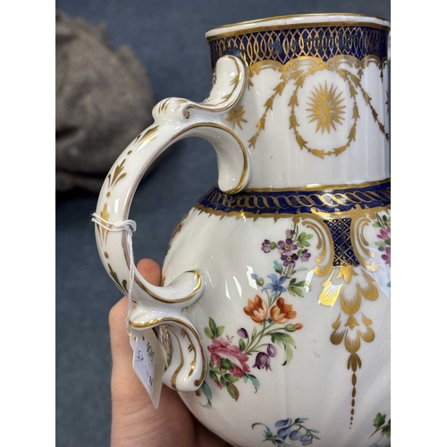 100 - TWO 18TH CENTURY GERMAN PORCELAIN CUPS AND SAUCERS painted with flowers; together with a French porc... 