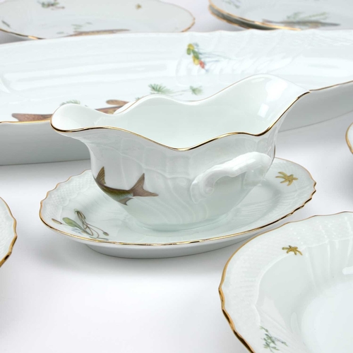 105 - A RICHARD GINORI PORCELAIN FISH SERVICE comprising a large oval platter, a double-lipped two-handled... 