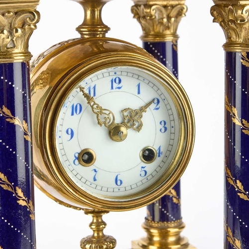 107 - A CONTINENTAL BRASS-MOUNTED PORCELAIN PORTICO CLOCK LATE 19TH/ EARLY 20TH CENTURY, IN THE VIENNA STY... 