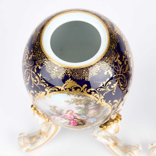 109 - A NEAR PAIR OF MEISSEN EGG-SHAPED VASES AND COVERS, CIRCA 1880 each on three rocaille feet, the ovoi... 