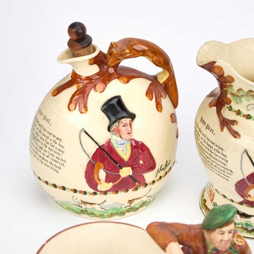 110 - A COLLECTION OF CROWN DEVON FIELDING'S POTTERY including musical jugs, tankards and flasks; together... 