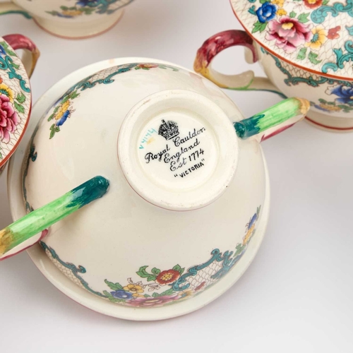 115 - A MATCHED ROYAL DOULTON BOOTHS 'FLORADORA' AND ROYAL CAULDON DINNER SERVICE comprising twelve soup c... 