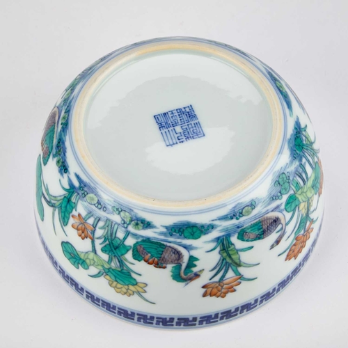 162 - A CHINESE DOUCAI BOWL the deep sides rounded at the base and straightening steeply towards the rim, ... 