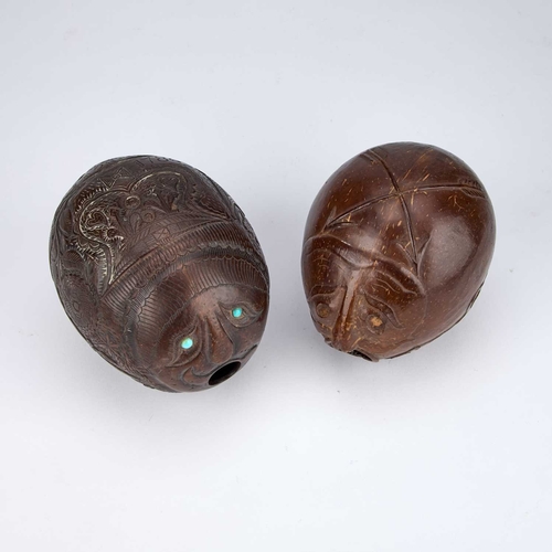28 - TWO CARVED COCONUT 'BUGBEARS' 18TH/ 19TH CENTURY each with a characteristic grotesque 'face' carved ... 