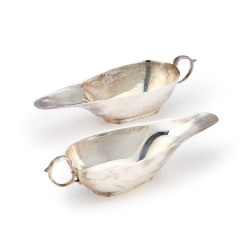 413 - A PAIR OF GEORGE V SILVER CREAM BOATS by S Blanckensee & Son Ltd, Birmingham 1913, of plain elon... 