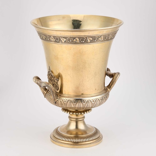 499 - A LARGE GEORGE IV SILVER-GILT WINE COOLER by John Bridge, London 1825, the flared circular bowl with... 