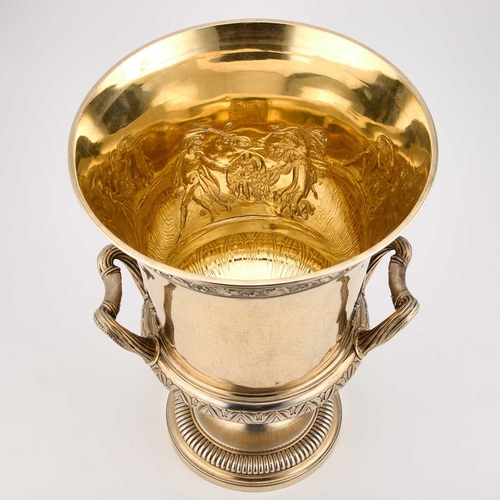 499 - A LARGE GEORGE IV SILVER-GILT WINE COOLER by John Bridge, London 1825, the flared circular bowl with... 