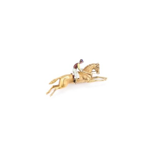 685 - A HORSE AND JOCKEY BROOCH the horse realistically modelled in a gallop, the jockey with enamelled si... 