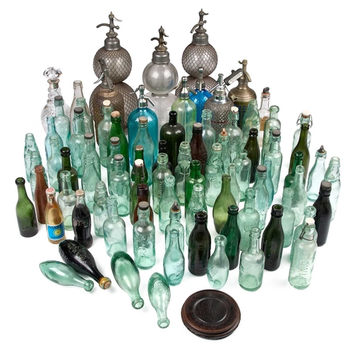 80 - A LARGE COLLECTION OF SODA SYPHONS AND BOTTLES including three large French Syphons and various bran... 