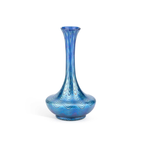 82 - AN EARLY 20TH CENTURY LOETZ GLASS VASE bottle-shaped with a squat body issuing a slender tapering ne... 