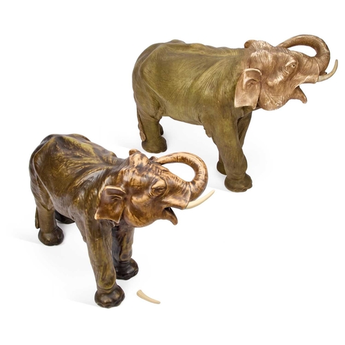 86 - A LARGE ROYAL DUX MODEL OF AN ELEPHANT, TOGETHER WITH ANOTHER LARGE ELEPHANT MODEL the first with an... 