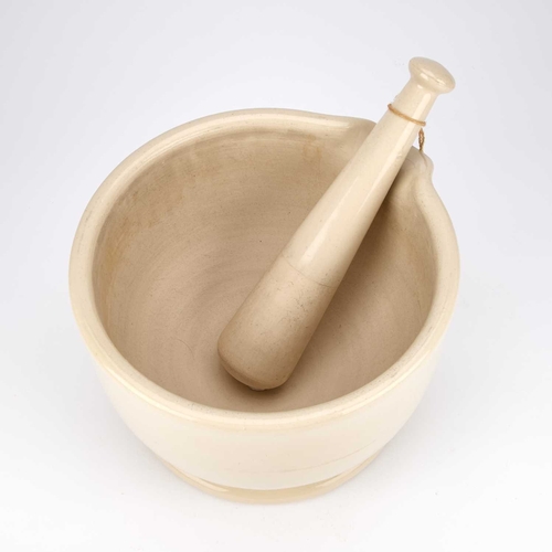 95 - A LARGE PHARMACEUTICAL PESTLE AND MORTAR LATE 19TH/ EARLY 20TH CENTURY circular with a deep bowl, im... 