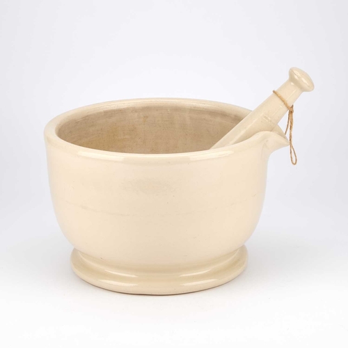 95 - A LARGE PHARMACEUTICAL PESTLE AND MORTAR LATE 19TH/ EARLY 20TH CENTURY circular with a deep bowl, im... 