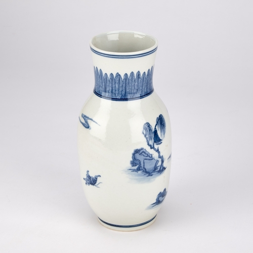 142 - A CHINESE CLUE AND WHITE PORCELAIN VASE DECORATED WITH FIGURES 25.5cm high