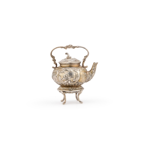 308 - A CONTINENTAL SILVER MINIATURE KETTLE ON STAND chased with scrolls and flowers. 7cm high overall, 1.... 