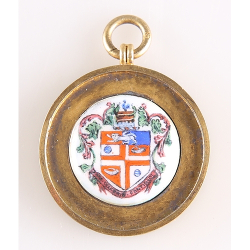 314 - A GEORGE V SILVER-GILT AND ENAMEL 'HARROGATE' FOB MEDALLION by Vaughton & Sons, Birmingham 1912,... 